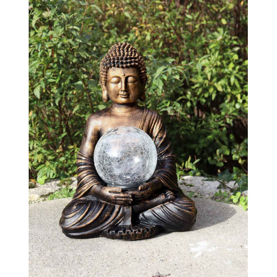 Lampe Bouddha assis avec boule lumineuse craquelée