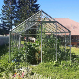 Serre en verre avec porte coulissante