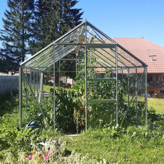Serre en verre avec porte coulissante