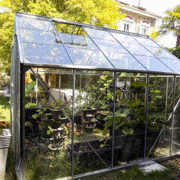 Serre en verre avec porte coulissante