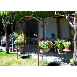 Arche de jardin double volute en acier fer vieilli